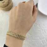 دستبند زنانه ژوپینگ مدل بافت حصیری طرح طلا کد B5423