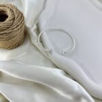 دستبند زنانه بنگل مدل گره و موج کد B5471