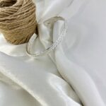 دستبند زنانه بنگل مدل موج و بافت کد B5472