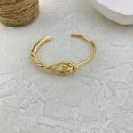 دستبند زنانه بنگل مینیمال مدل گره کد B5353