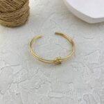دستبند زنانه بنگل مینیمال مدل گره کد B5351