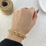 دستبند زنانه ژوپینگ مدل تراش طرح طلا کد B5427