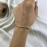 دستبند زنانه ژوپینگ بنگل مدل موج کد B5524
