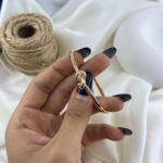 دستبند زنانه ژوپینگ بنگل مدل گره B5610