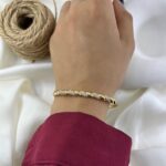 دستبند زنانه ژوپینگ بنگل مدل پیچ جواهری B5605