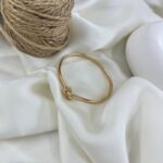 دستبند زنانه ژوپینگ بنگل مدل گره B5610
