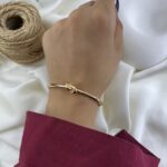 دستبند زنانه ژوپینگ بنگل مدل گره B5610